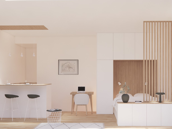 Bright and airy Scandinavian-style studio apartment interior featuring a clean design with neutral tones, minimalist furniture, a bar counter with stools, wooden accents, and natural light.