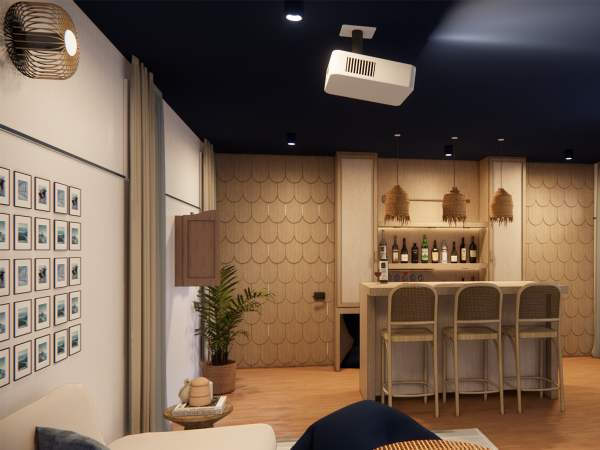 An inviting home bar setup with a beige textured wall, woven pendant lights, and modern bar stools against a dark ceiling. The image presents a warm and intimate corner of a home bar that exudes sophistication and comfort. The wall is adorned with beige, textured panels that give a sense of depth and warmth to the space. Above the bar, three woven pendant lights hang, their natural materials and textures contrasting beautifully with the sleek bottles and glassware on the open shelves. The bar itself is a simple, elegant counter attended by modern bar stools with woven seats, blending contemporary design with a touch of rustic charm. The scene is grounded by a dark ceiling that enhances the cozy ambiance, while a projector adds a modern twist to this otherwise timeless setup. A collection of framed photographs on the left wall adds a personal touch, showcasing cherished memories. The overall composition is a testament to tasteful interior design, where every element is carefully chosen to create a welcoming atmosphere for socializing and relaxation.