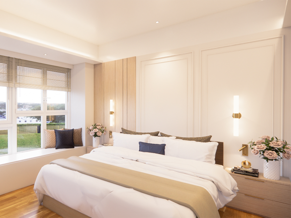 A cozy bedroom featuring a large bed with white linens, wooden headboard, ambient wall lighting, and a window with blinds overlooking greenery. This image presents a peaceful and inviting bedroom, meticulously designed to provide a sanctuary for rest. The room is illuminated by soft, ambient light that enhances the calming color scheme. Center stage is a king-sized bed dressed in crisp white linens, accented with navy and taupe pillows that contribute to the room's tranquil atmosphere. A wooden headboard extends the length of the bed, complementing the warm tones of the herringbone-patterned flooring. The wall is adorned with elegant paneling and two vertical, cylindrical wall sconces that emit a warm glow. A large window, equipped with horizontal blinds, offers a glimpse of the lush outdoors and fills the room with natural light. Each bedside is thoughtfully styled with minimalistic decor, including a small collection of books, a chic table lamp, and fresh pink roses in a textured vase, creating a sense of balance and harmony. This bedroom design embodies a modern yet timeless appeal, emphasizing comfort and simplicity.